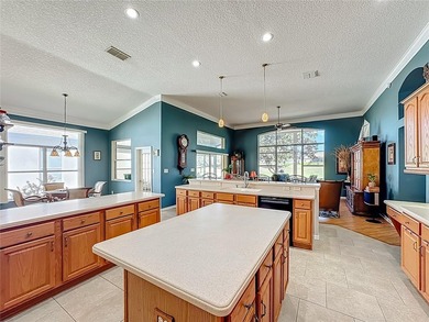 Stunning Golf Course Home Perfect for Entertaining & All on Plantation Golf Club in Florida - for sale on GolfHomes.com, golf home, golf lot