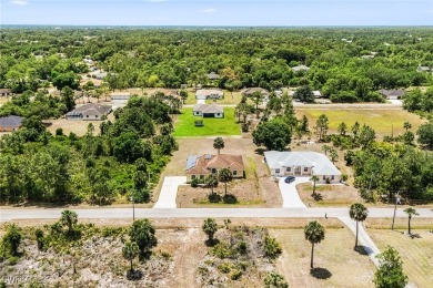 It's not every day you find a home where your backyard feels on Lehigh Resort Club in Florida - for sale on GolfHomes.com, golf home, golf lot