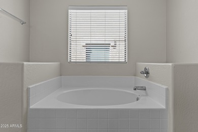 Nestled just off the 14th hole of the Las Colinas Golf Course on Las Colinas Golf Club in Arizona - for sale on GolfHomes.com, golf home, golf lot