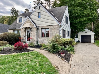 Enjoy the English Tudor charm of this stone cottage. This house on The Chillicothe Country Club in Ohio - for sale on GolfHomes.com, golf home, golf lot