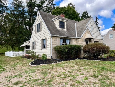 Enjoy the English Tudor charm of this stone cottage. This house on The Chillicothe Country Club in Ohio - for sale on GolfHomes.com, golf home, golf lot