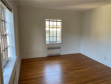A RARE opportunity to own a well-maintained, all brick 6 family on Silver Lake Golf Course in New York - for sale on GolfHomes.com, golf home, golf lot