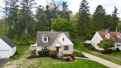 Enjoy the English Tudor charm of this stone cottage. This house on The Chillicothe Country Club in Ohio - for sale on GolfHomes.com, golf home, golf lot