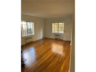 A RARE opportunity to own a well-maintained, all brick 6 family on Silver Lake Golf Course in New York - for sale on GolfHomes.com, golf home, golf lot