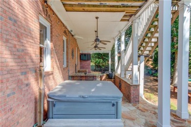 Lakefront living in Hamilton Mill, priced to sell! This spacious on Hamilton Mill Golf Club in Georgia - for sale on GolfHomes.com, golf home, golf lot