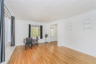 A RARE opportunity to own a well-maintained, all brick 6 family on Silver Lake Golf Course in New York - for sale on GolfHomes.com, golf home, golf lot