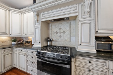 HERITAGE ON THE GOLF COURSE! Embrace multigenerational, luxury on Heritage Golf Club in North Carolina - for sale on GolfHomes.com, golf home, golf lot