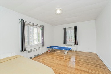 A RARE opportunity to own a well-maintained, all brick 6 family on Silver Lake Golf Course in New York - for sale on GolfHomes.com, golf home, golf lot