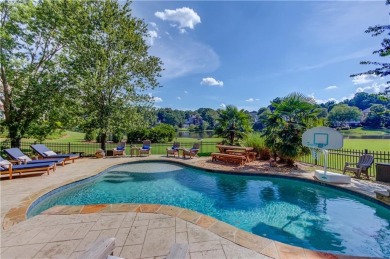 Lakefront living in Hamilton Mill, priced to sell! This spacious on Hamilton Mill Golf Club in Georgia - for sale on GolfHomes.com, golf home, golf lot