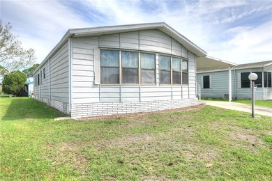 Priced for immediate sale. Cash only. This Jacobson Island on Barefoot Bay Golf Course in Florida - for sale on GolfHomes.com, golf home, golf lot