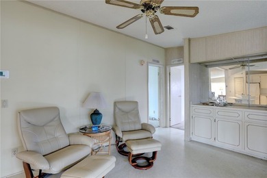 Priced for immediate sale. Cash only. This Jacobson Island on Barefoot Bay Golf Course in Florida - for sale on GolfHomes.com, golf home, golf lot