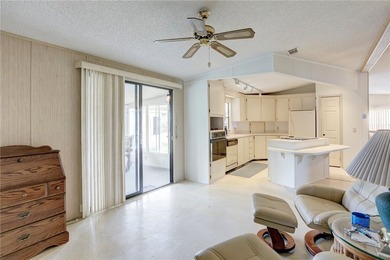 Priced for immediate sale. Cash only. This Jacobson Island on Barefoot Bay Golf Course in Florida - for sale on GolfHomes.com, golf home, golf lot