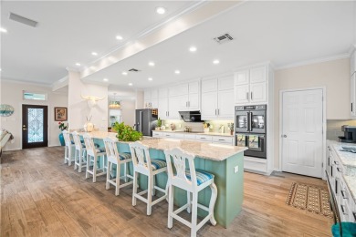 Welcome to 2110 Harbor Ct, a custom waterfront retreat located on Rockport Country Club in Texas - for sale on GolfHomes.com, golf home, golf lot