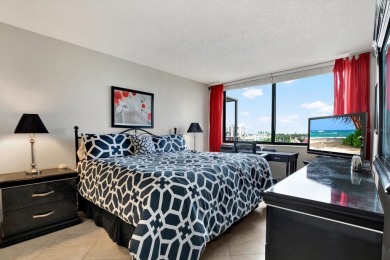 Discover your own slice of paradise in this beautiful 2-bedroom on Isla Del Sol Yacht and Country Club in Florida - for sale on GolfHomes.com, golf home, golf lot