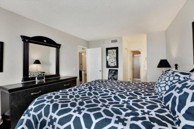 Discover your own slice of paradise in this beautiful 2-bedroom on Isla Del Sol Yacht and Country Club in Florida - for sale on GolfHomes.com, golf home, golf lot