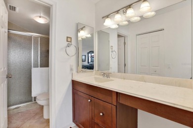 Discover your own slice of paradise in this beautiful 2-bedroom on Isla Del Sol Yacht and Country Club in Florida - for sale on GolfHomes.com, golf home, golf lot
