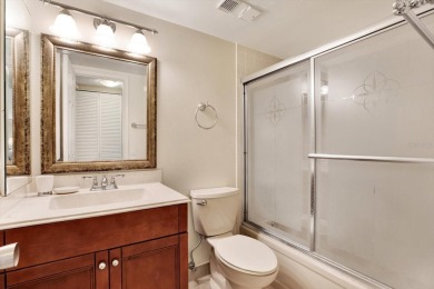 Discover your own slice of paradise in this beautiful 2-bedroom on Isla Del Sol Yacht and Country Club in Florida - for sale on GolfHomes.com, golf home, golf lot