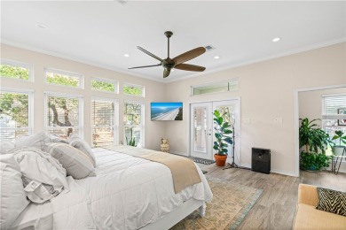 Welcome to 2110 Harbor Ct, a custom waterfront retreat located on Rockport Country Club in Texas - for sale on GolfHomes.com, golf home, golf lot