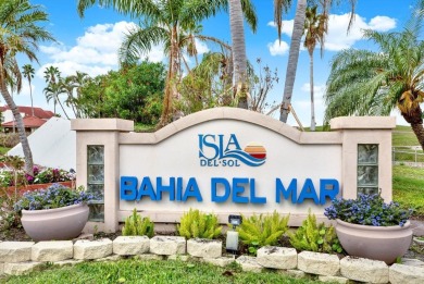 Discover your own slice of paradise in this beautiful 2-bedroom on Isla Del Sol Yacht and Country Club in Florida - for sale on GolfHomes.com, golf home, golf lot