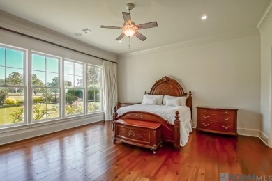 Experience unparalleled luxury in this stunning home located in on Country Club of Louisiana in Louisiana - for sale on GolfHomes.com, golf home, golf lot