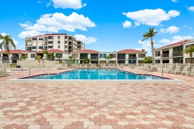 Discover your own slice of paradise in this beautiful 2-bedroom on Isla Del Sol Yacht and Country Club in Florida - for sale on GolfHomes.com, golf home, golf lot