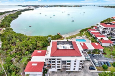 Discover your own slice of paradise in this beautiful 2-bedroom on Isla Del Sol Yacht and Country Club in Florida - for sale on GolfHomes.com, golf home, golf lot
