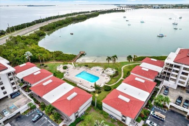 Discover your own slice of paradise in this beautiful 2-bedroom on Isla Del Sol Yacht and Country Club in Florida - for sale on GolfHomes.com, golf home, golf lot