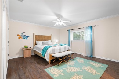 Welcome to 2110 Harbor Ct, a custom waterfront retreat located on Rockport Country Club in Texas - for sale on GolfHomes.com, golf home, golf lot