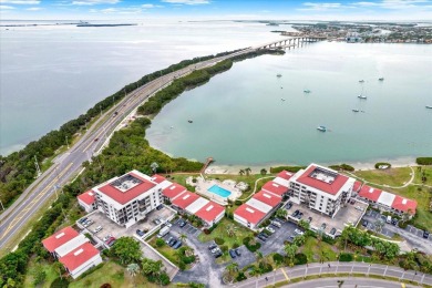 Discover your own slice of paradise in this beautiful 2-bedroom on Isla Del Sol Yacht and Country Club in Florida - for sale on GolfHomes.com, golf home, golf lot