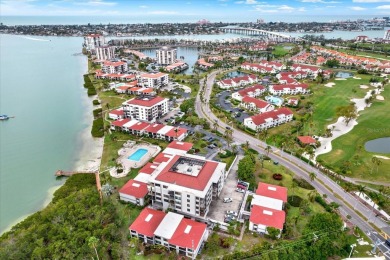 Discover your own slice of paradise in this beautiful 2-bedroom on Isla Del Sol Yacht and Country Club in Florida - for sale on GolfHomes.com, golf home, golf lot
