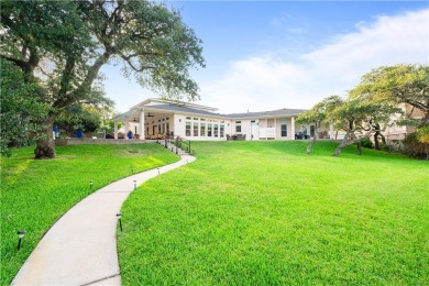 Welcome to 2110 Harbor Ct, a custom waterfront retreat located on Rockport Country Club in Texas - for sale on GolfHomes.com, golf home, golf lot