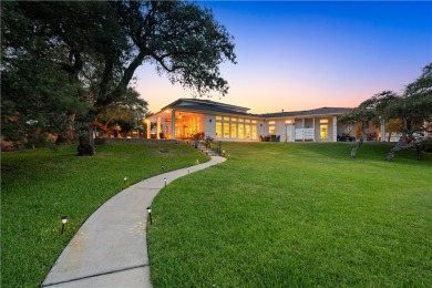 Welcome to 2110 Harbor Ct, a custom waterfront retreat located on Rockport Country Club in Texas - for sale on GolfHomes.com, golf home, golf lot