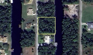Come build your forever home on this one-half acre CANAL lot on Indian Lake Estates Golf and Country Club in Florida - for sale on GolfHomes.com, golf home, golf lot