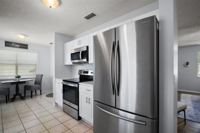 BOND PAID!  Welcome to this Delightful 2 Bedroom, 2 Bath Ranch on Tierra Del Sol Golf and Country Club in Florida - for sale on GolfHomes.com, golf home, golf lot