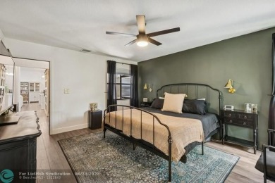 Desirable 2BR/2BA end-unit villa with expansive lake views in on Deer Creek Golf Club in Florida - for sale on GolfHomes.com, golf home, golf lot