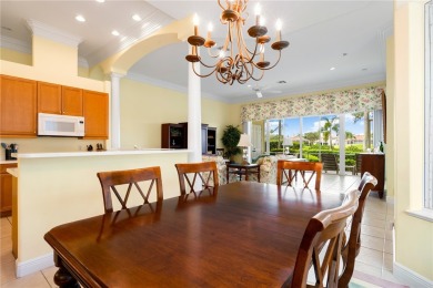 Courtyard pool home on a golf course in the coveted Grand Harbor on Grand Harbor Golf and Country Club in Florida - for sale on GolfHomes.com, golf home, golf lot