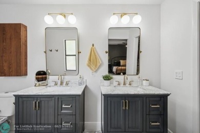 Desirable 2BR/2BA end-unit villa with expansive lake views in on Deer Creek Golf Club in Florida - for sale on GolfHomes.com, golf home, golf lot