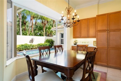 Courtyard pool home on a golf course in the coveted Grand Harbor on Grand Harbor Golf and Country Club in Florida - for sale on GolfHomes.com, golf home, golf lot