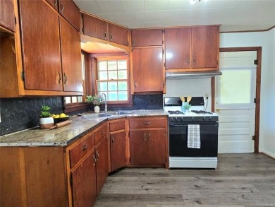 Tucked away in a peaceful/established neighborhood near the on Drumright Golf Club in Oklahoma - for sale on GolfHomes.com, golf home, golf lot