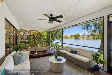 Desirable 2BR/2BA end-unit villa with expansive lake views in on Deer Creek Golf Club in Florida - for sale on GolfHomes.com, golf home, golf lot