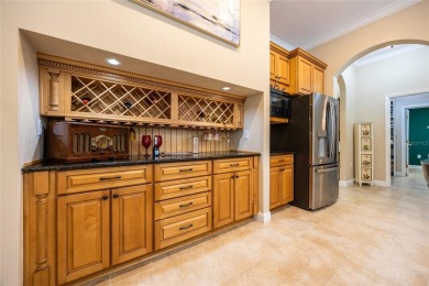 Come enjoy the cool breeze blowing across the front porch of on Haile Plantation Golf and Country Club in Florida - for sale on GolfHomes.com, golf home, golf lot