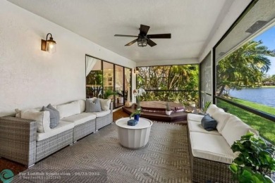 Desirable 2BR/2BA end-unit villa with expansive lake views in on Deer Creek Golf Club in Florida - for sale on GolfHomes.com, golf home, golf lot