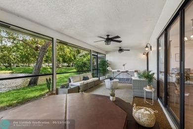 Desirable 2BR/2BA end-unit villa with expansive lake views in on Deer Creek Golf Club in Florida - for sale on GolfHomes.com, golf home, golf lot