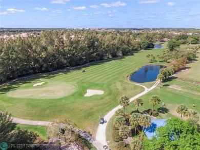 Desirable 2BR/2BA end-unit villa with expansive lake views in on Deer Creek Golf Club in Florida - for sale on GolfHomes.com, golf home, golf lot