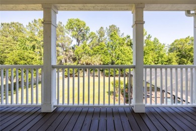 Come enjoy the cool breeze blowing across the front porch of on Haile Plantation Golf and Country Club in Florida - for sale on GolfHomes.com, golf home, golf lot