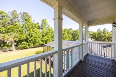 Come enjoy the cool breeze blowing across the front porch of on Haile Plantation Golf and Country Club in Florida - for sale on GolfHomes.com, golf home, golf lot