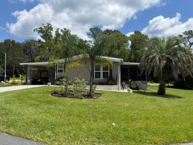 This magnificent double-wide mobile home in the desirable on Rolling Greens Executive Golf Community in Florida - for sale on GolfHomes.com, golf home, golf lot