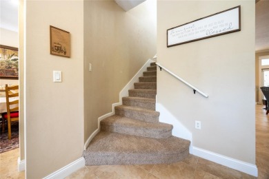 Come enjoy the cool breeze blowing across the front porch of on Haile Plantation Golf and Country Club in Florida - for sale on GolfHomes.com, golf home, golf lot