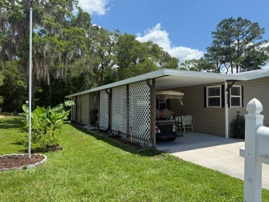 This magnificent double-wide mobile home in the desirable on Rolling Greens Executive Golf Community in Florida - for sale on GolfHomes.com, golf home, golf lot