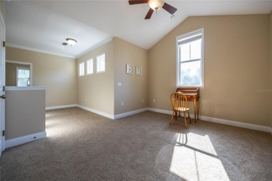 Come enjoy the cool breeze blowing across the front porch of on Haile Plantation Golf and Country Club in Florida - for sale on GolfHomes.com, golf home, golf lot